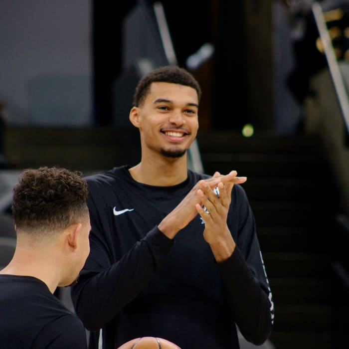 Jan 4, 2024; San Antonio, Texas, USA; San Antonio Spurs rookie Victor Wembanyama (1) smiles while fans sing him 'Happy Birthday' prior to facing the Milwaukee Bucks.